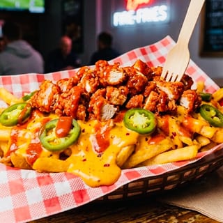 Bae,s Fire Fries (Chopped tender, Spicy Mayo, Cheese, Jalapeños & Inferno Sauce)